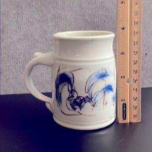 Pottery thumb rest mug